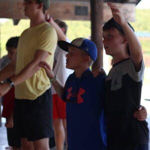 Middle school boys at Christian summer camp praising God. This is Shepherd's Fold Ranch