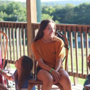 Summer camp teen girls talking at Shepherd's Fold Ranch