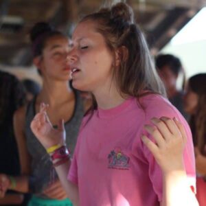 Summer Church Camp: Girl worshiping God at Shepherd's Fold Ranch