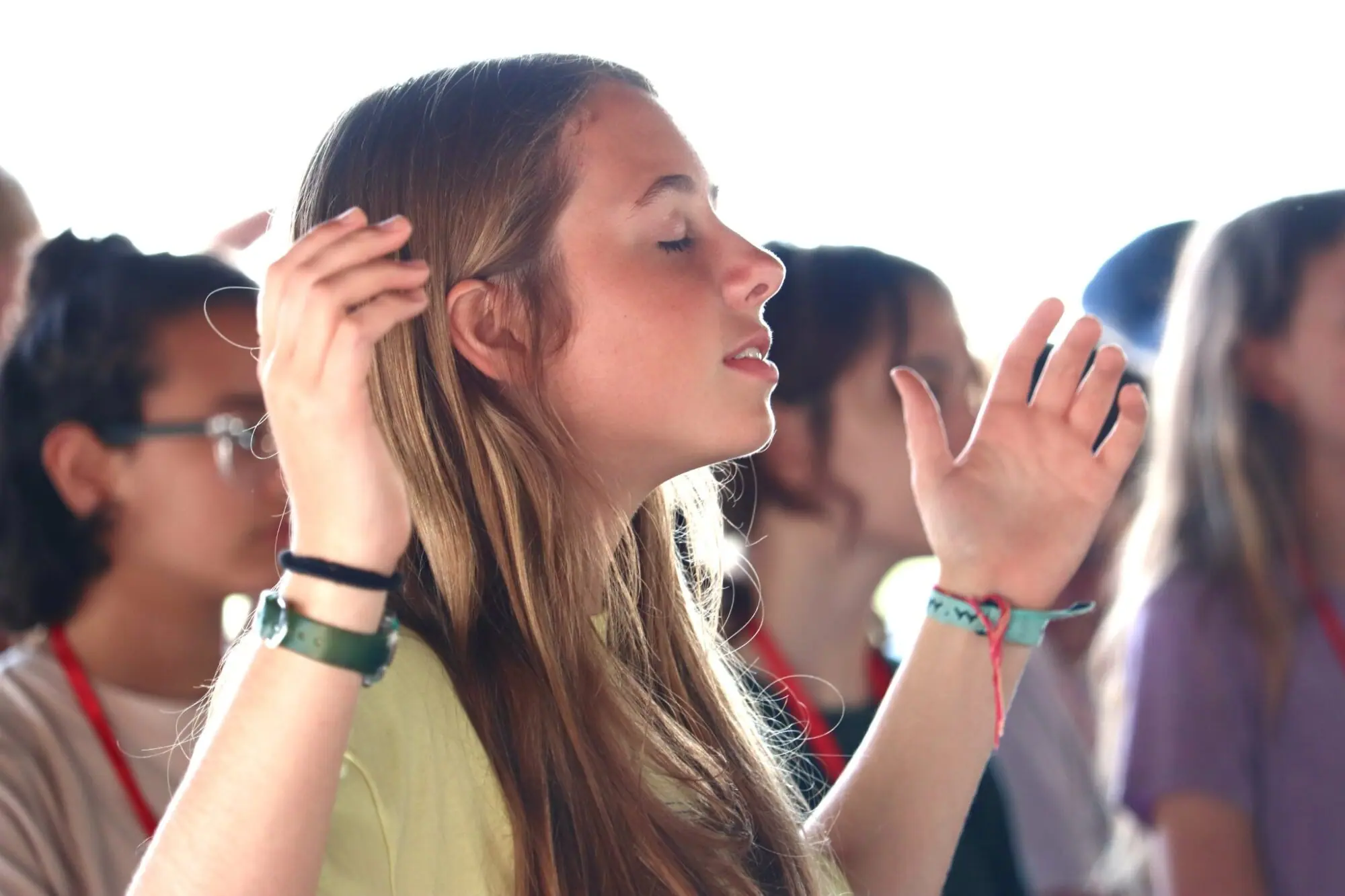 Young woman during worship time